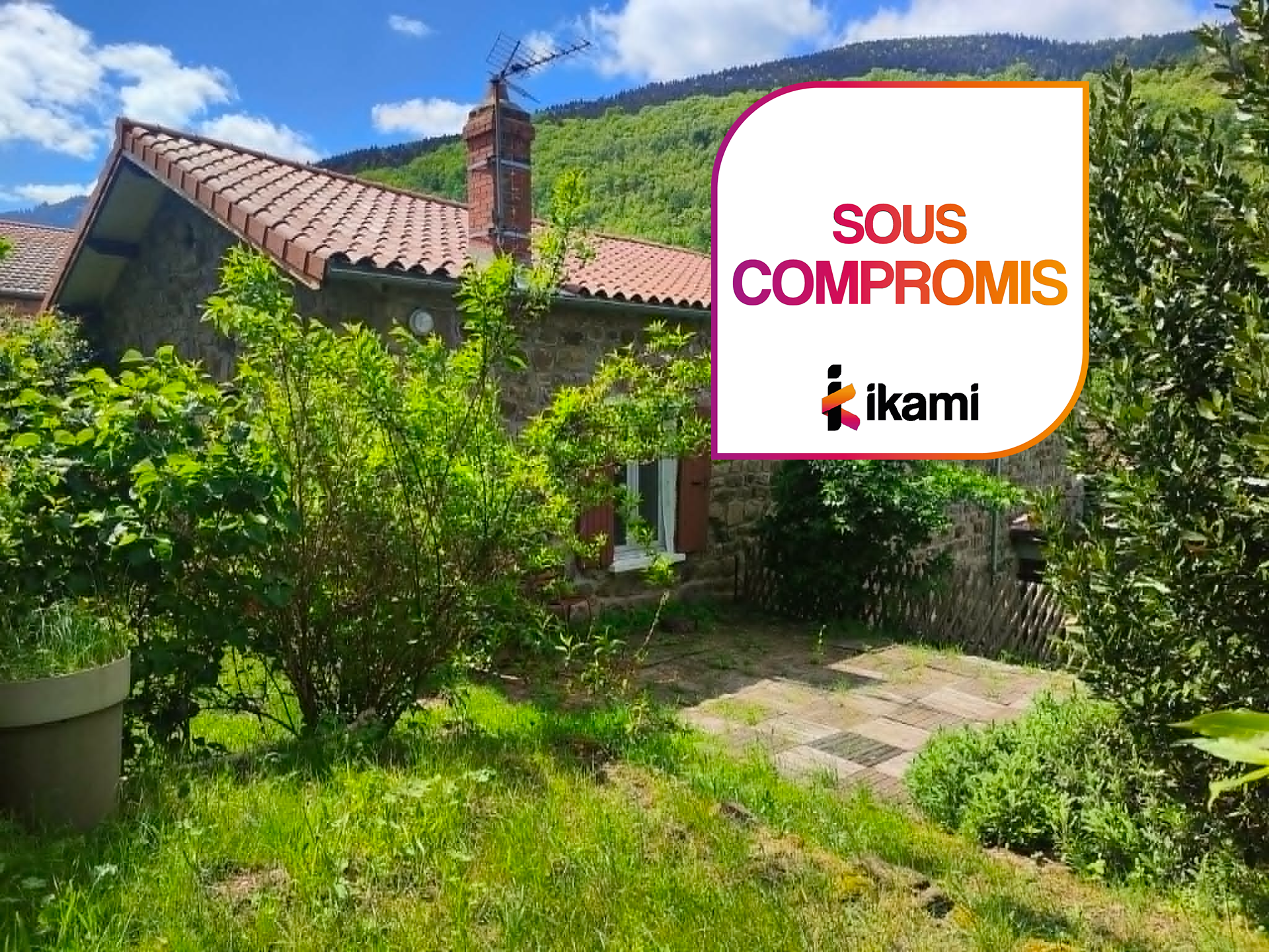 Maison en pierre avec terrain attenant