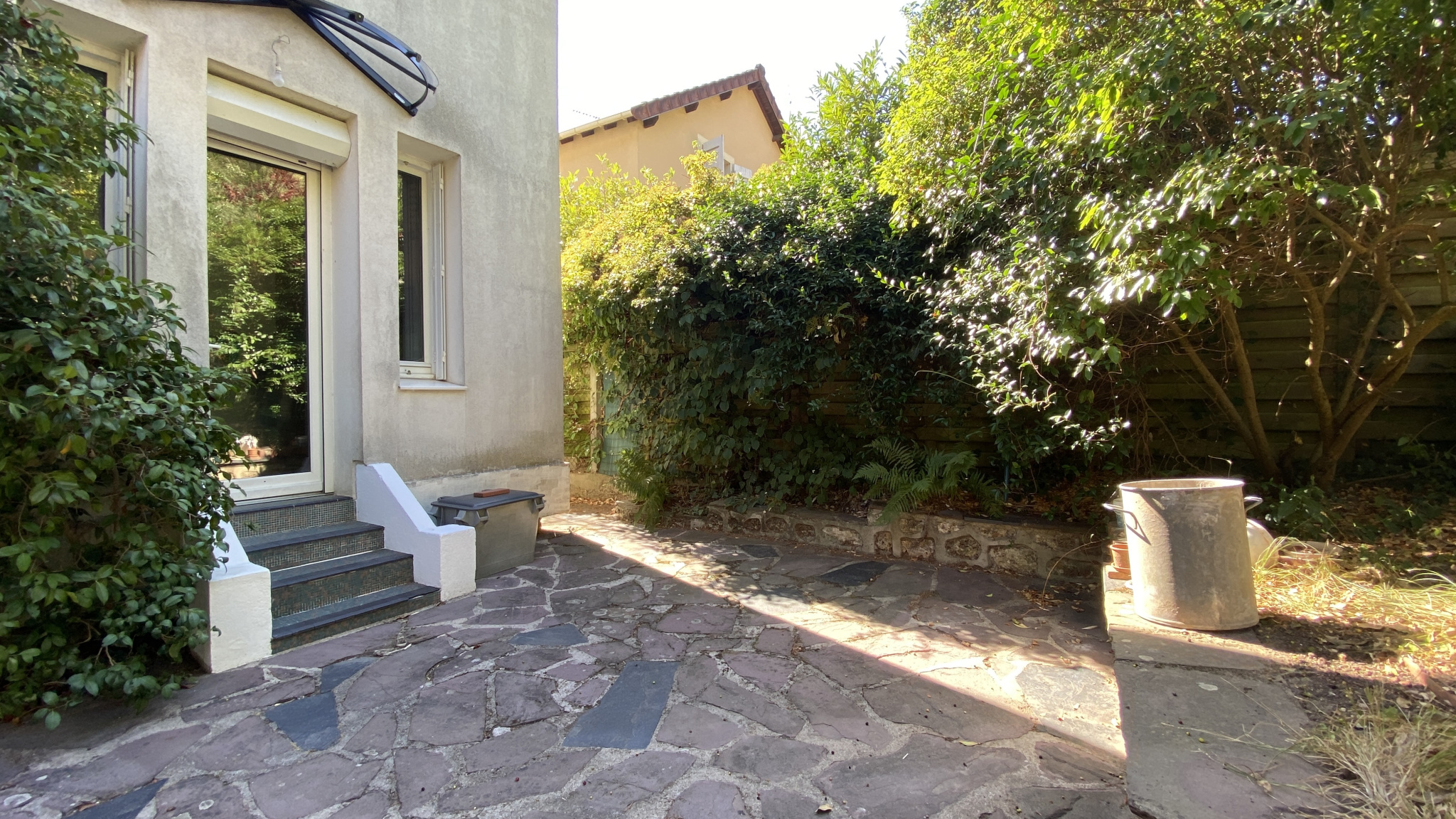 Appartement triplex avec jardin commun